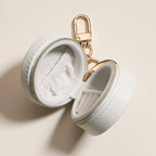 Mini Round Jewelry Travel Case with Keychain – White & Pink Bow Design: IV / ONE