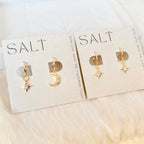 STAR & MOON HUGGIE HOOPS | gold | celestial charm earrings