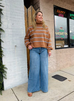 COCO STRIPED TURTLENECK HIGH LOW SWEATER