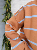 COCO STRIPED TURTLENECK HIGH LOW SWEATER