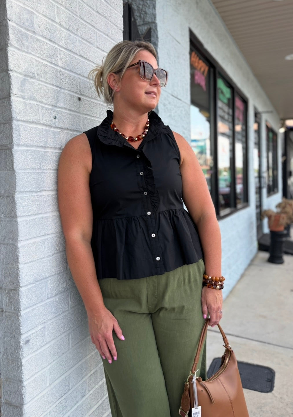 Black Solid Ruffle Collar Sleeveless Peplum Top with Ruffle Hem