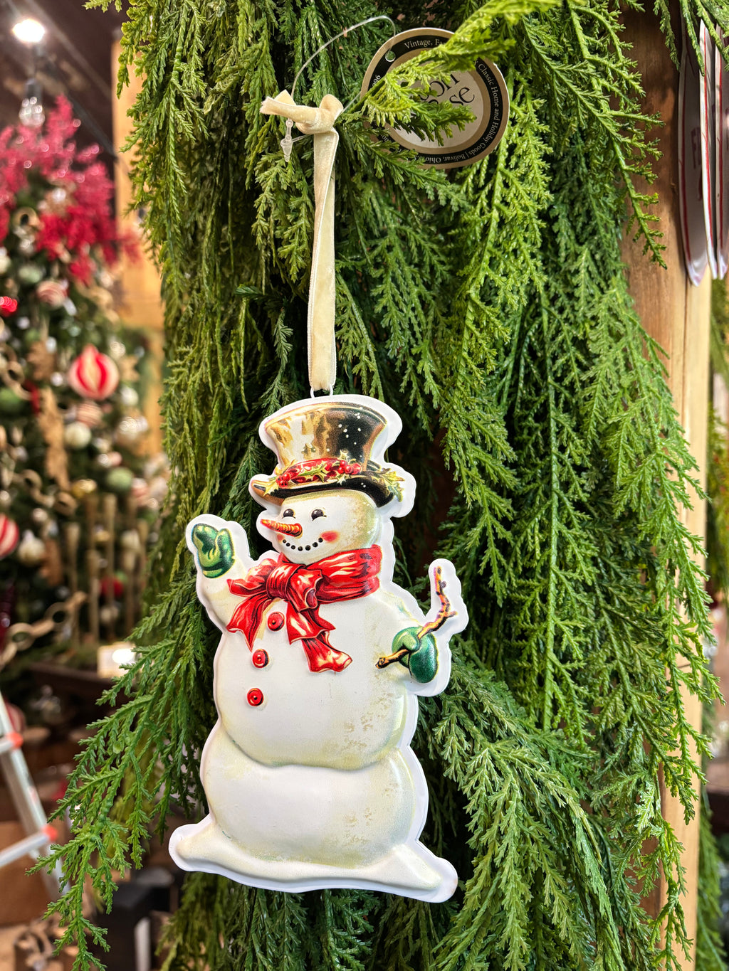 Metal Snowman w/red bow orn.