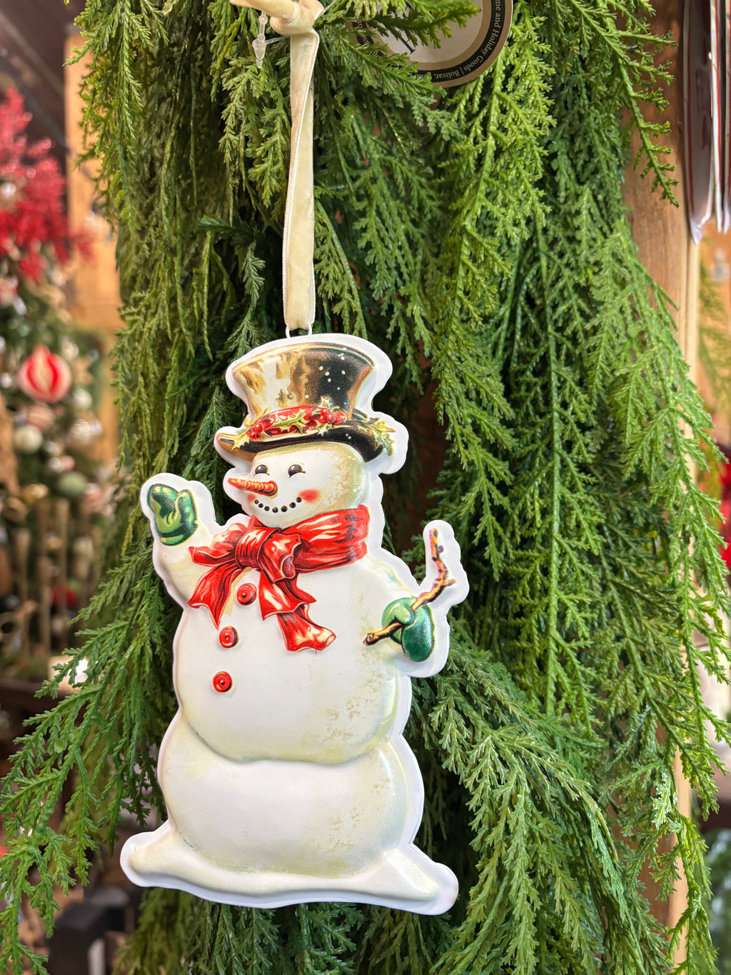 Metal Snowman w/red bow orn.