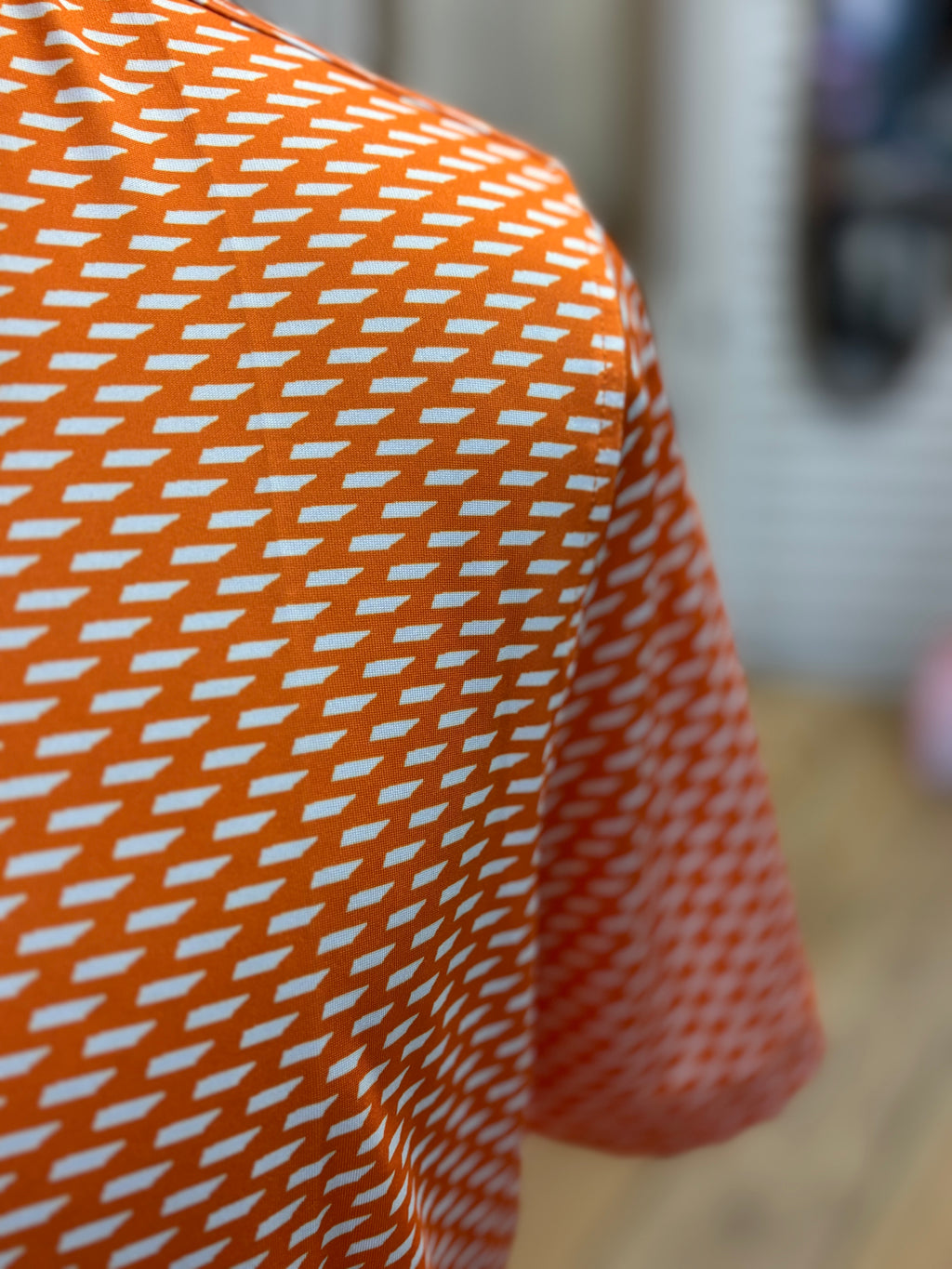 Knoxville Orange and White State Performance Polo