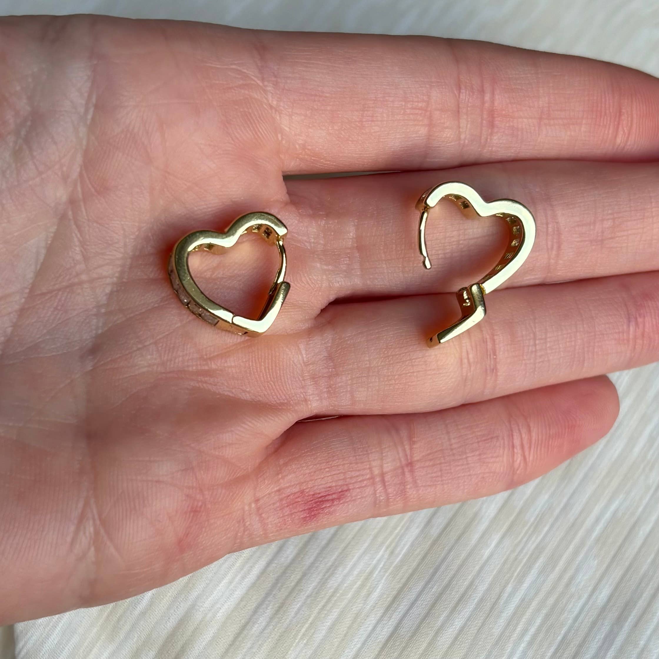 CRYSTAL HEART HOOPS |18k gold | clasp heart huggie hoop